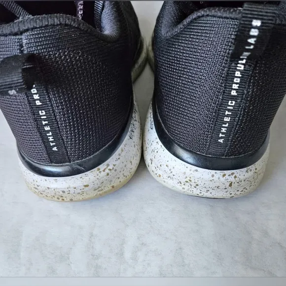 APL Techloom Pro black running shoes speckled soles