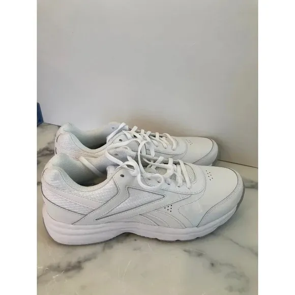 Néw mens reeboks sz 12(L4) slip and oil resistant shoes​