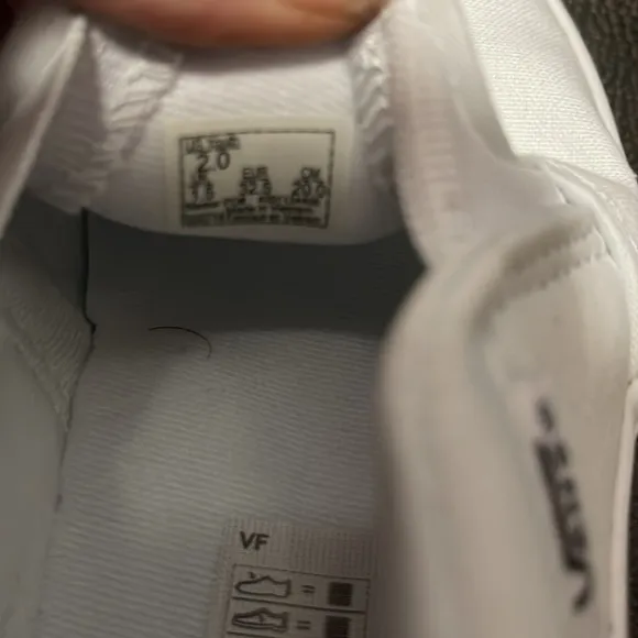 Size 2 in Youths White Vans