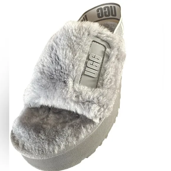 UGG Disco Slides Shoes cozy fluff and retro-style platform soles.